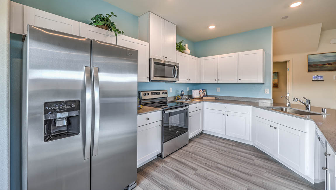 The Whirlpool Stainless Steel Refrigerator, Microwave, and Range in our 1349 model kitchen.