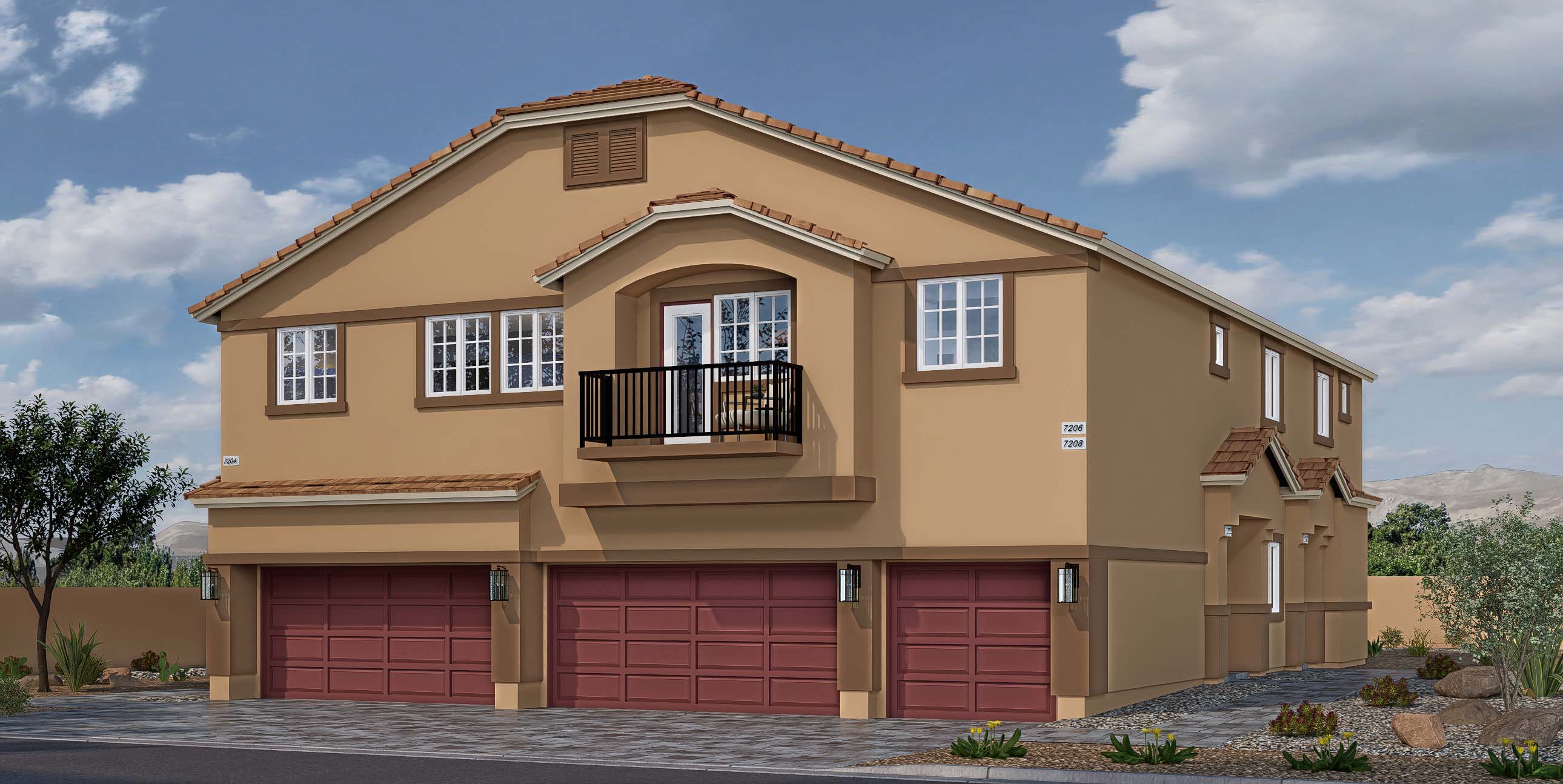 Our 1600 model home in the Juno Pointe community with tan and red exterior paint schemes, a flat tile roof, common area landscaping, paver walkways, and a 2-car garage.