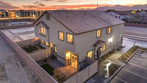 Exteriors in our Juno Pointe Community featuring designer-selected paint schemes, common area landscaping, paver walkways, and offering 1-2 car garages.