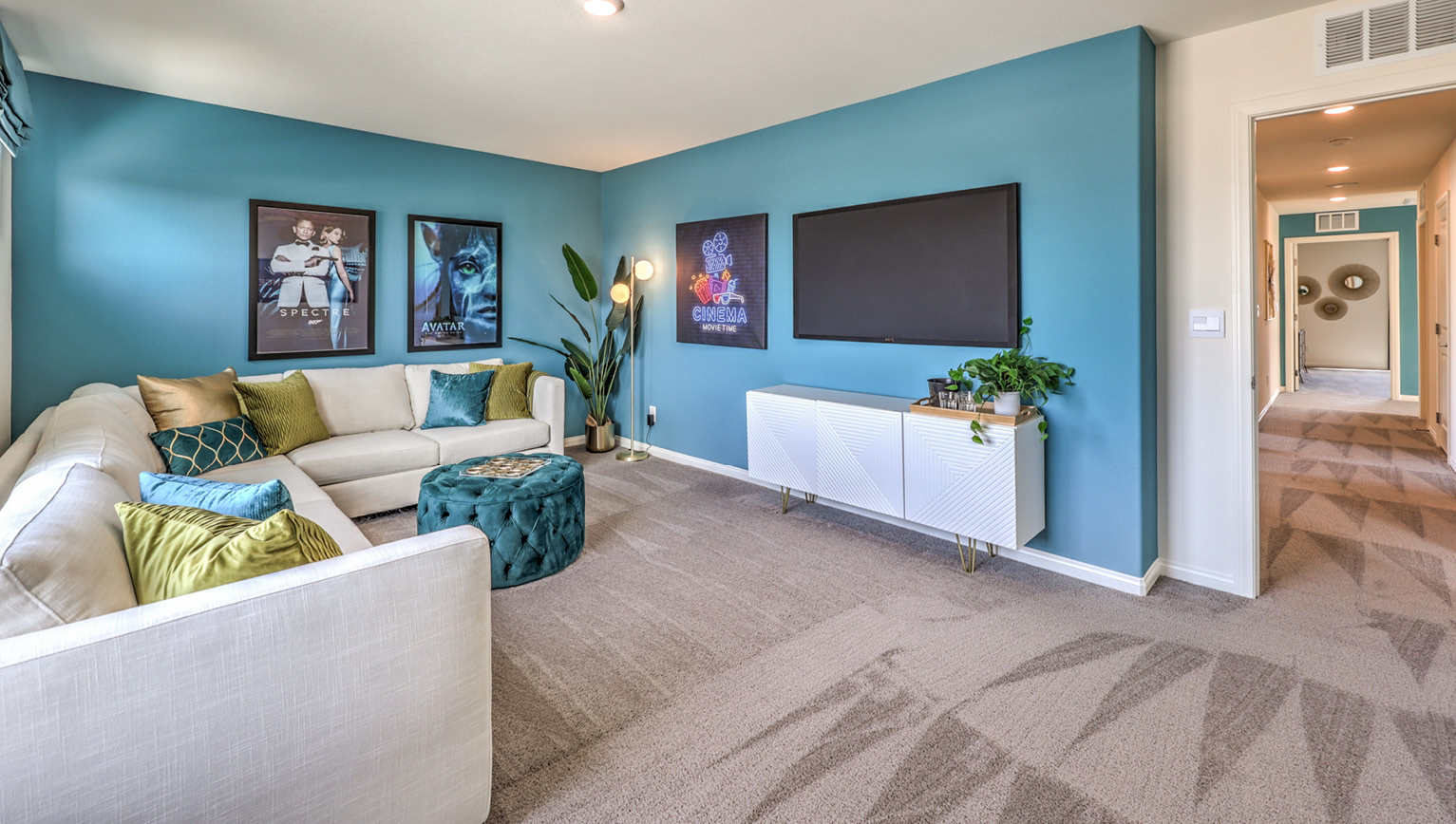 The upstairs loft in our 2600 model with carpet flooring and large windows.