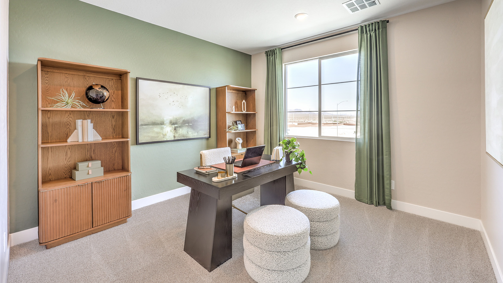 Bedroom Two in our Heartland Summit 4418 model with carpet flooring, a walk-in closet, and a window.