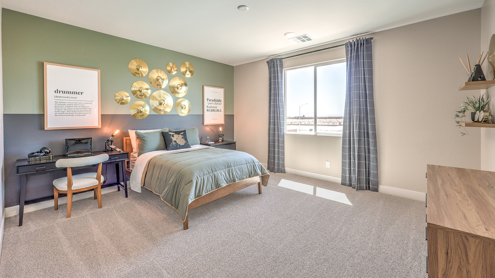 The Bedroom Three option in our Heartland Summit 4418 model with carpet flooring, a walk-in closet, and a window