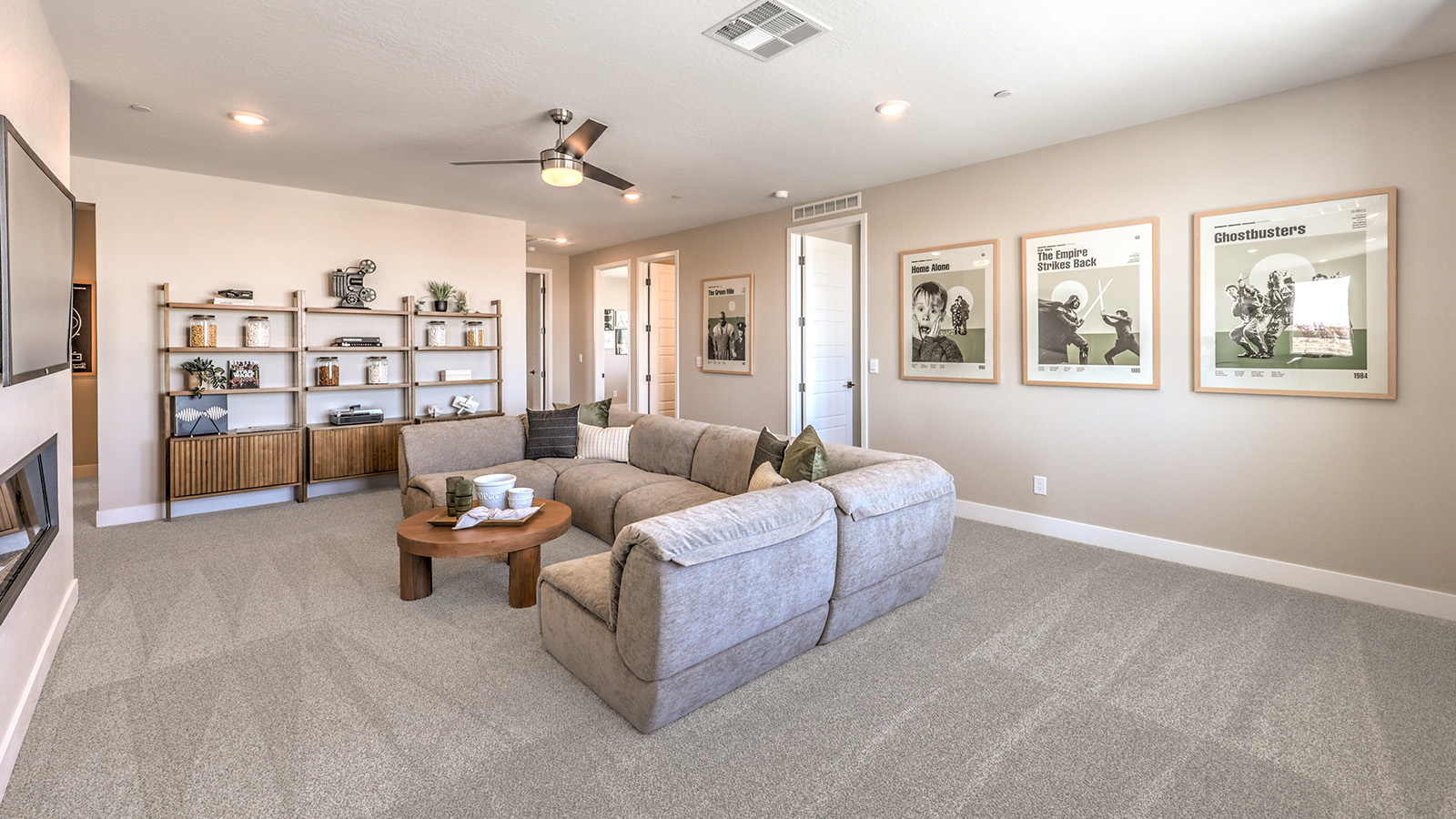 The upstairs loft in our 4418 model with carpet flooring and large windows.