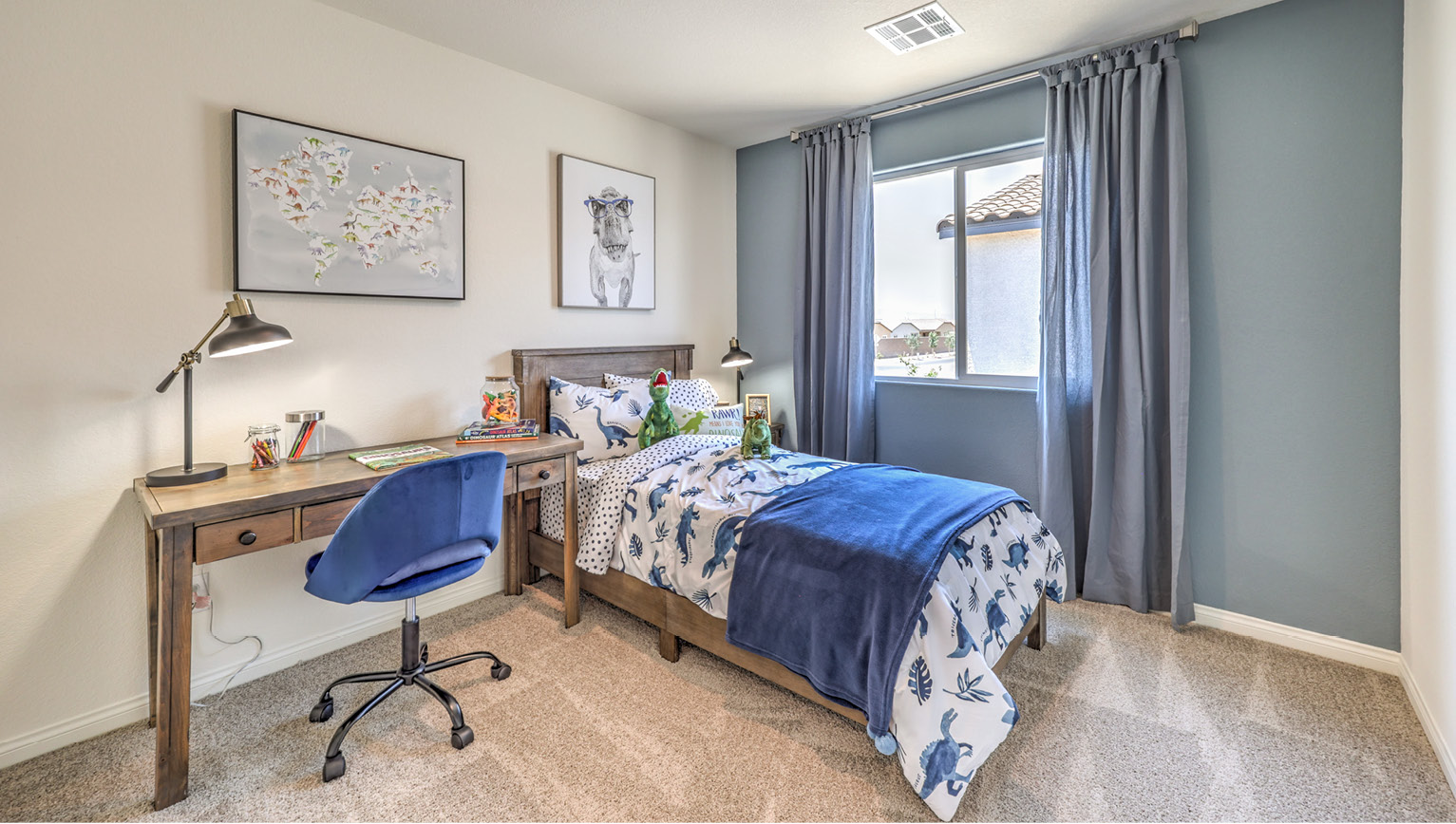 Bedroom Three in our Heartland Bay 1865 model with carpet flooring, a sliding closet, and one window.