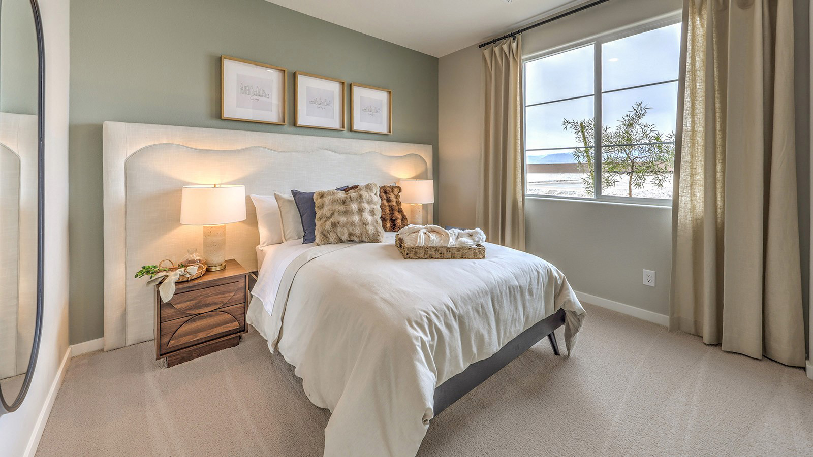 Bedroom Five in our Heartland Grove 2048 model with carpet flooring, a sliding closet, and a window.