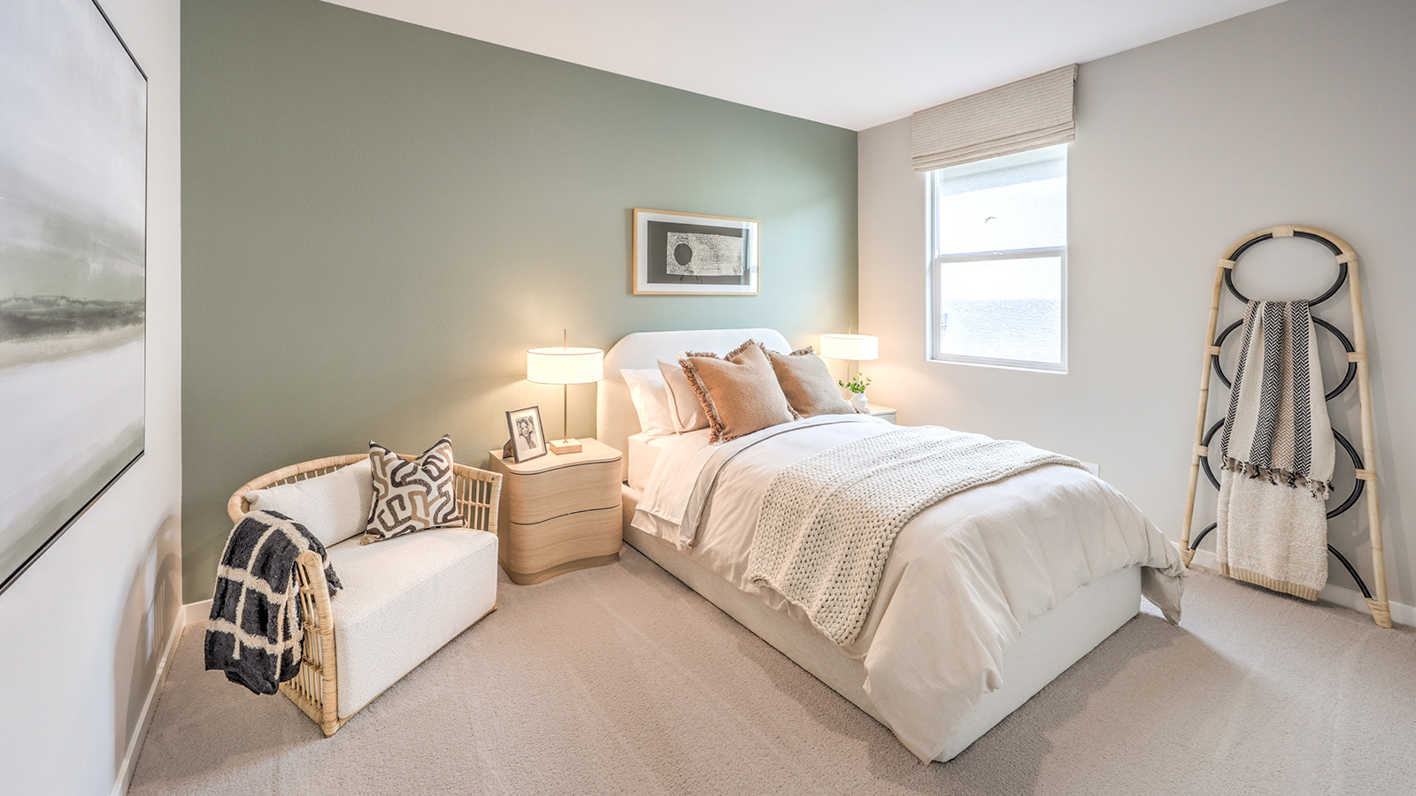 Bedroom Three in our Heartland Grove 2048 model with carpet flooring, a sliding closet, and a window.