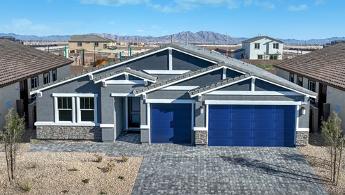 Our 2538 model home in the Symmetry Manor community with grey and blue exterior paint schemes, a flat tile roof, front yard landscaping, paver walkways, and a three-car garage.