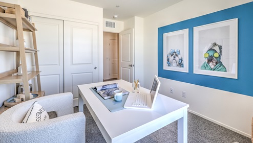 the second bedroom of this specific model has been used to show the versatility of our bedrooms by making this a home office. This room is spacious and can accommodate a working desk or full sized bed and furniture or entertainment center. This bedroom also has a window and a sliding door closet.