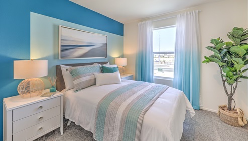This specific model has a third bedroom. This bedroom is spacious enough to have a full size bed, night stand and dresser. It has a window and a sliding door closet
