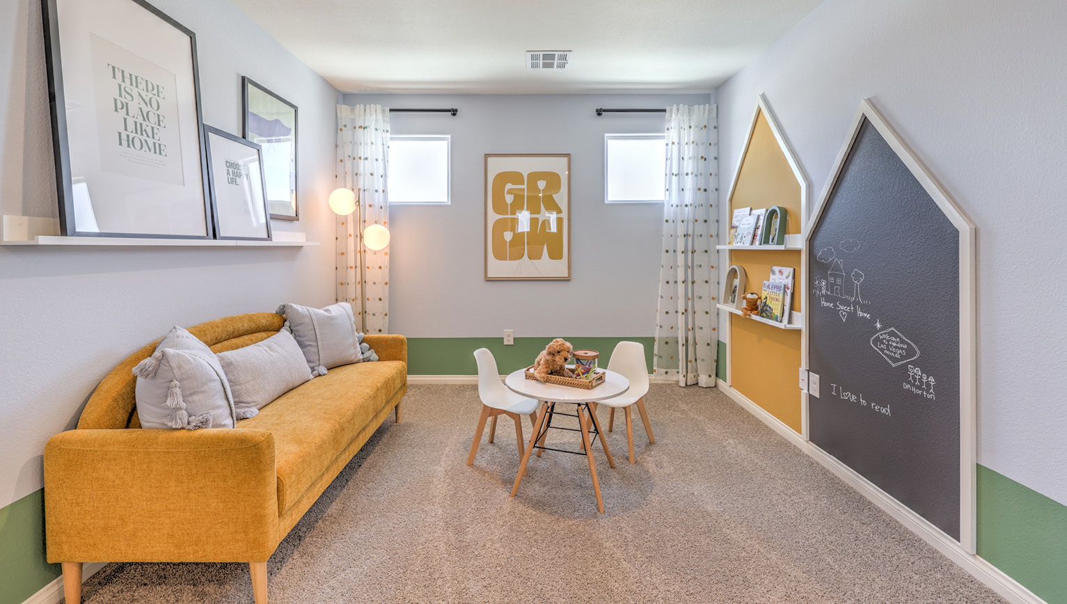 The loft in our Kalea Bay 1865 plan with carpet flooring and two windows