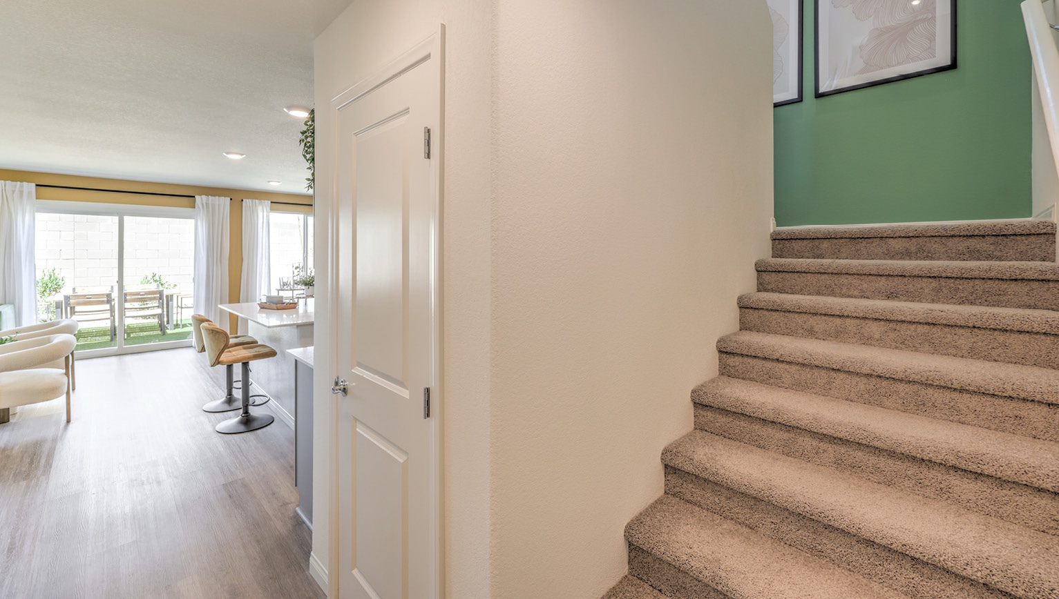 As you enter the home the staircase to the second floor is on your right hand side