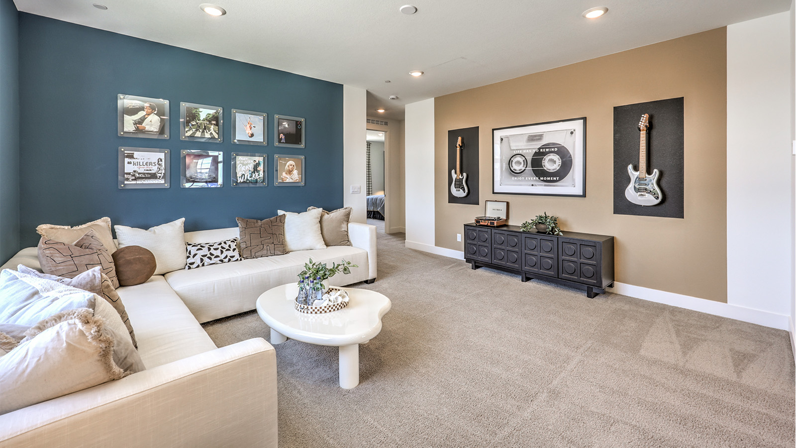 The upstairs loft in our 3000 model with carpet flooring and large windows.