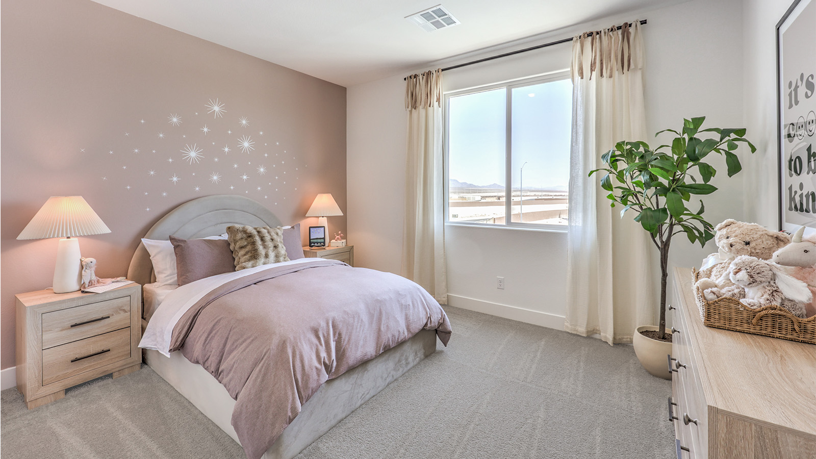 Bedroom Two in our Heartland Falls 2660 model with carpet flooring, a sliding closet, and a window.