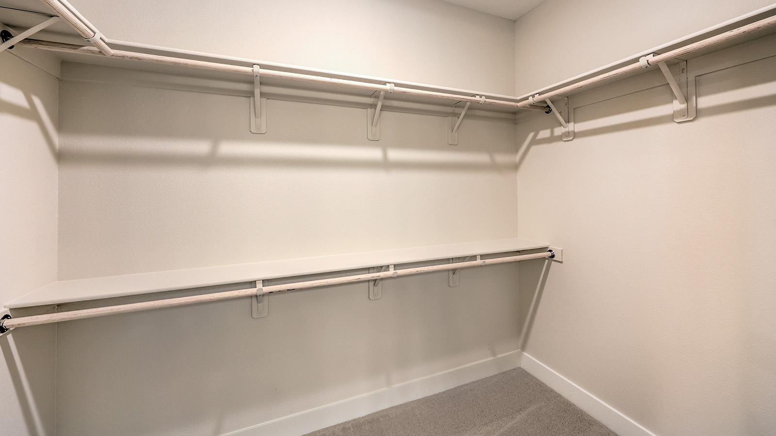 The walk-in closet in our 2436 Bedroom One Suite.