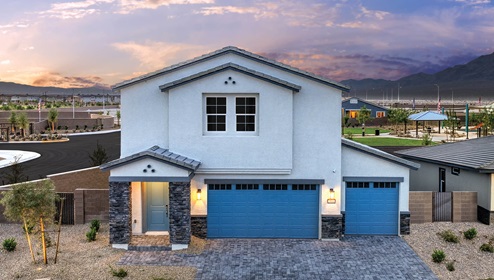 Our 3001 model home in the Heartland Falls community with blue and white exterior paint schemes, a flat tile roof, front yard landscaping, 3-car garage, and paver walkways.
