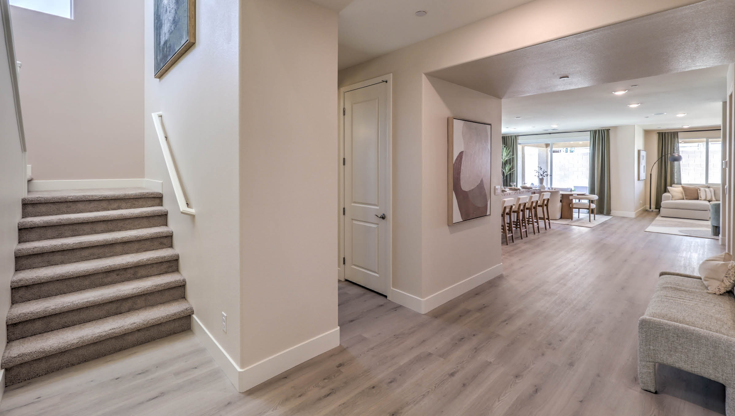 The front door entrance to our Heartland Summit 4425 model with Luxury Vinyl Plank Flooring