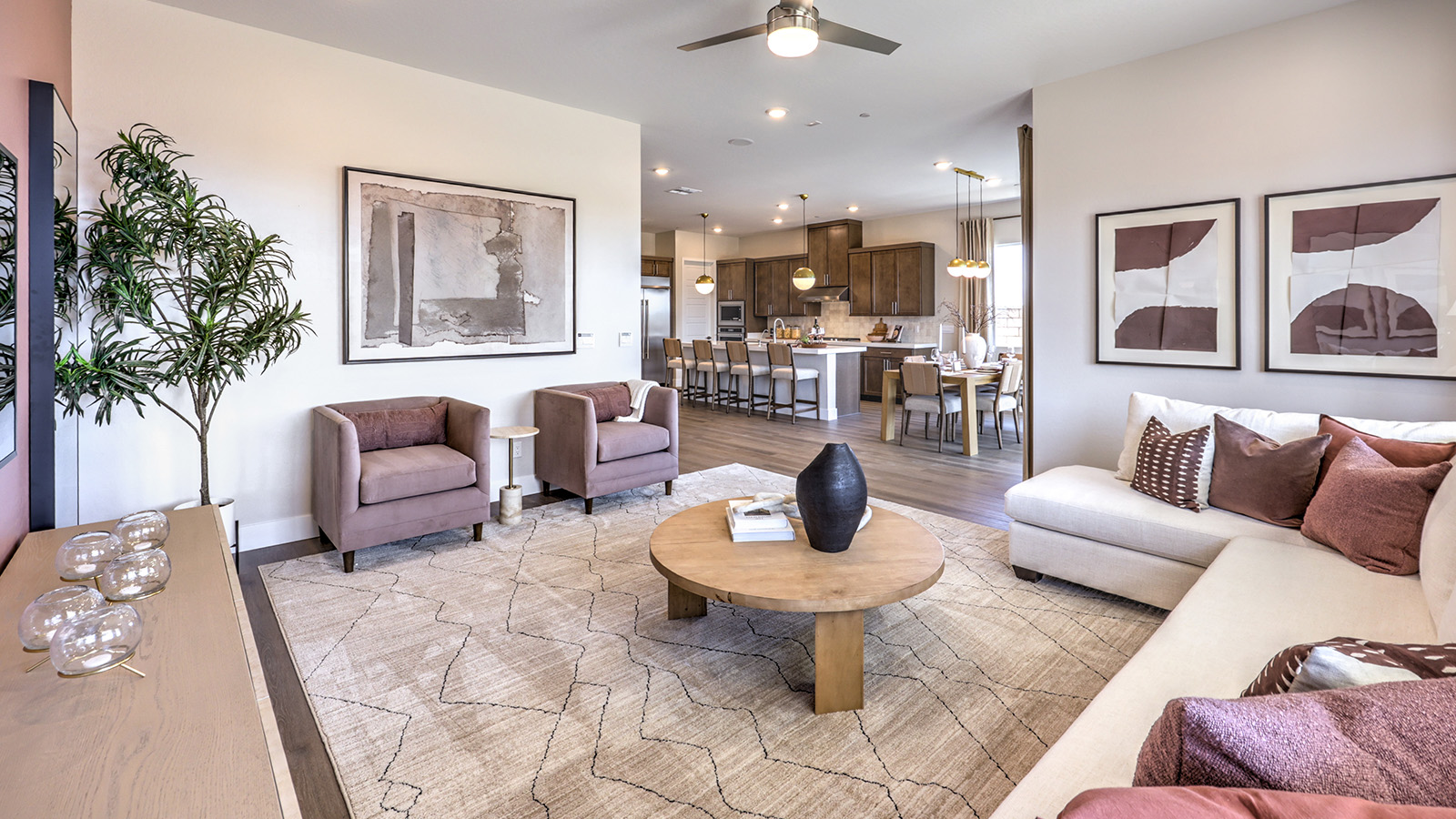 The Heartland Summit 4418 Plan open concept Great Room with Luxury Vinyl Plank Flooring and large windows.