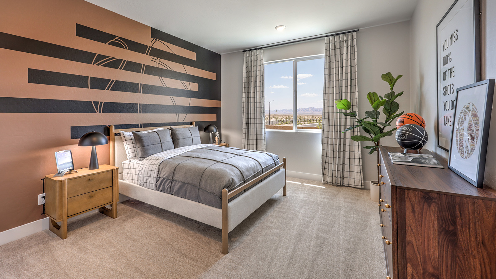Bedroom Three in our Heartland Summit 3774 model with carpet flooring, a sliding closet, and a window.