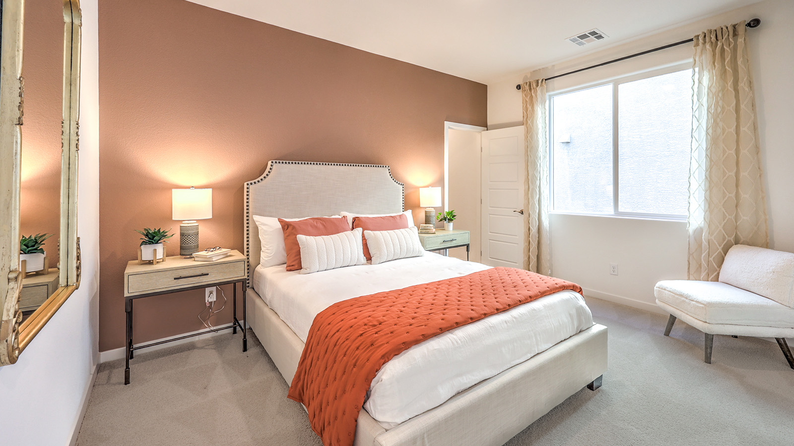 The Tropical Falls 3000 Model Fifth Bedroom, shown as a home office, features wall-to-wall carpet, a large window for natural light, and a spacious layout with a closet. This flexible room can be used as a private office, guest room, or additional bedroom, offering both functionality and quiet separation from the main living areas.