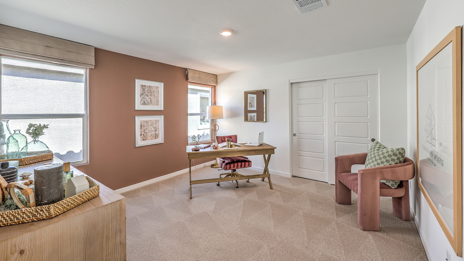 The Tropical Falls 3000 Model Fourth Bedroom featuring plush wall-to-wall carpet, a large layout with soft natural light, and a sliding door closet. This versatile space is ideal for use as a nursery, guest room, or additional bedroom, offering comfort and privacy with easy access to nearby bathrooms.