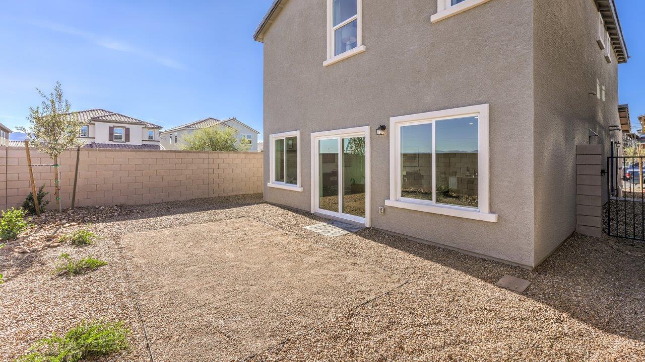 The backyard in our Meranto Bay 1802 plan with desert landscaping.