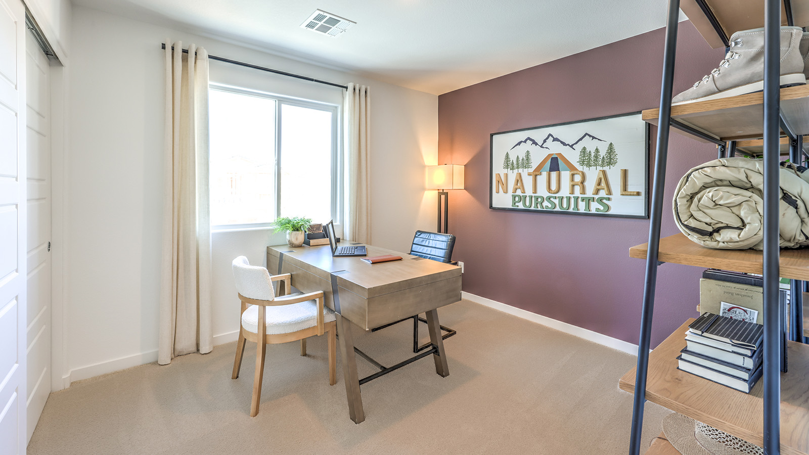 The Office/Bedroom Four option in our Meranto Bay 1802 model with carpet flooring, a sliding closet, and a window, furnished with a desk and chair.