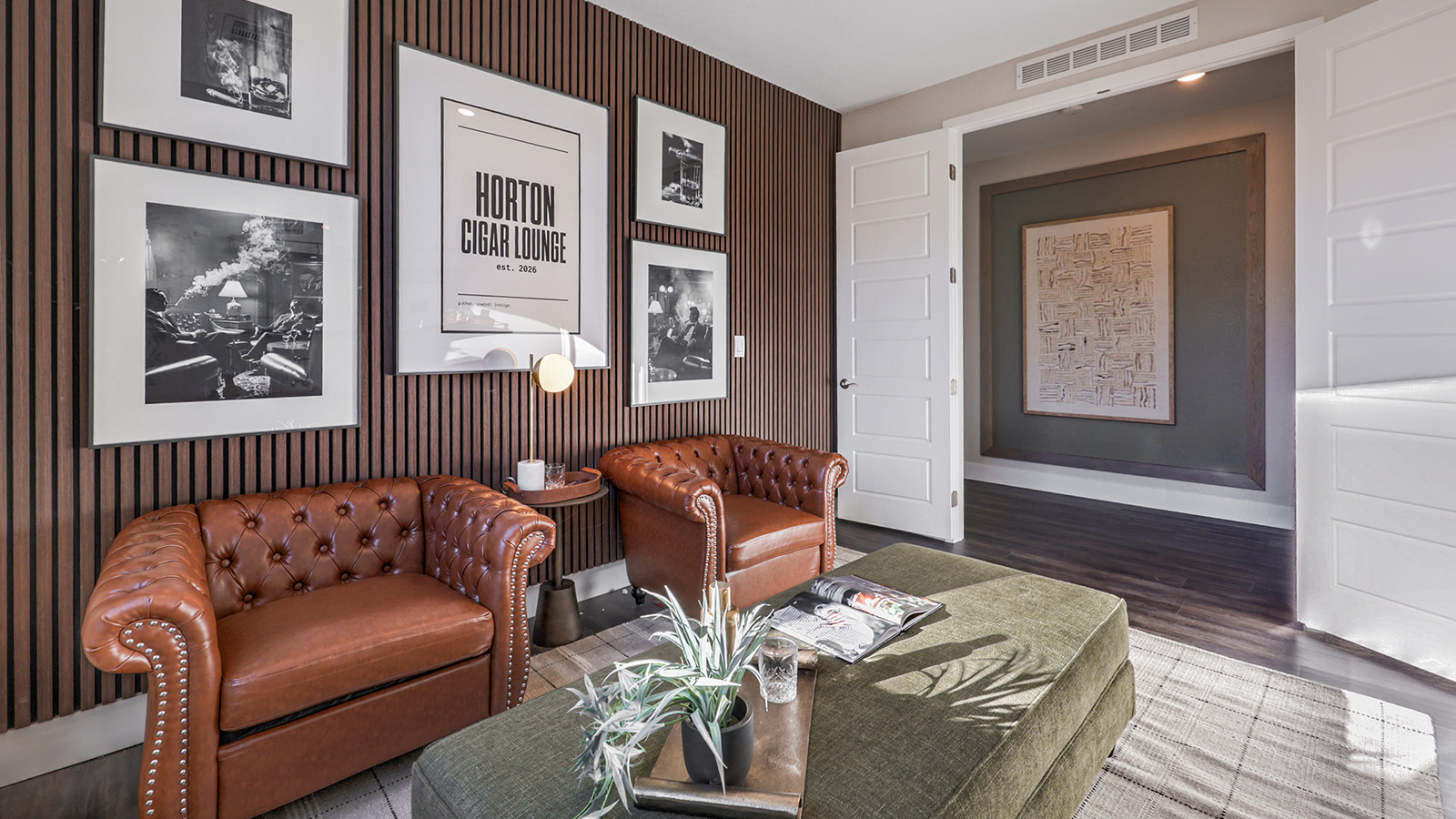 The Majestic Hills 2650 Plan Bedroom 2 featuring plush wall-to-wall carpet, a large window for natural light, and a double-door closet for storage. Conveniently located near shared living spaces, this versatile bedroom is ideal for guests, family members, or a home office.