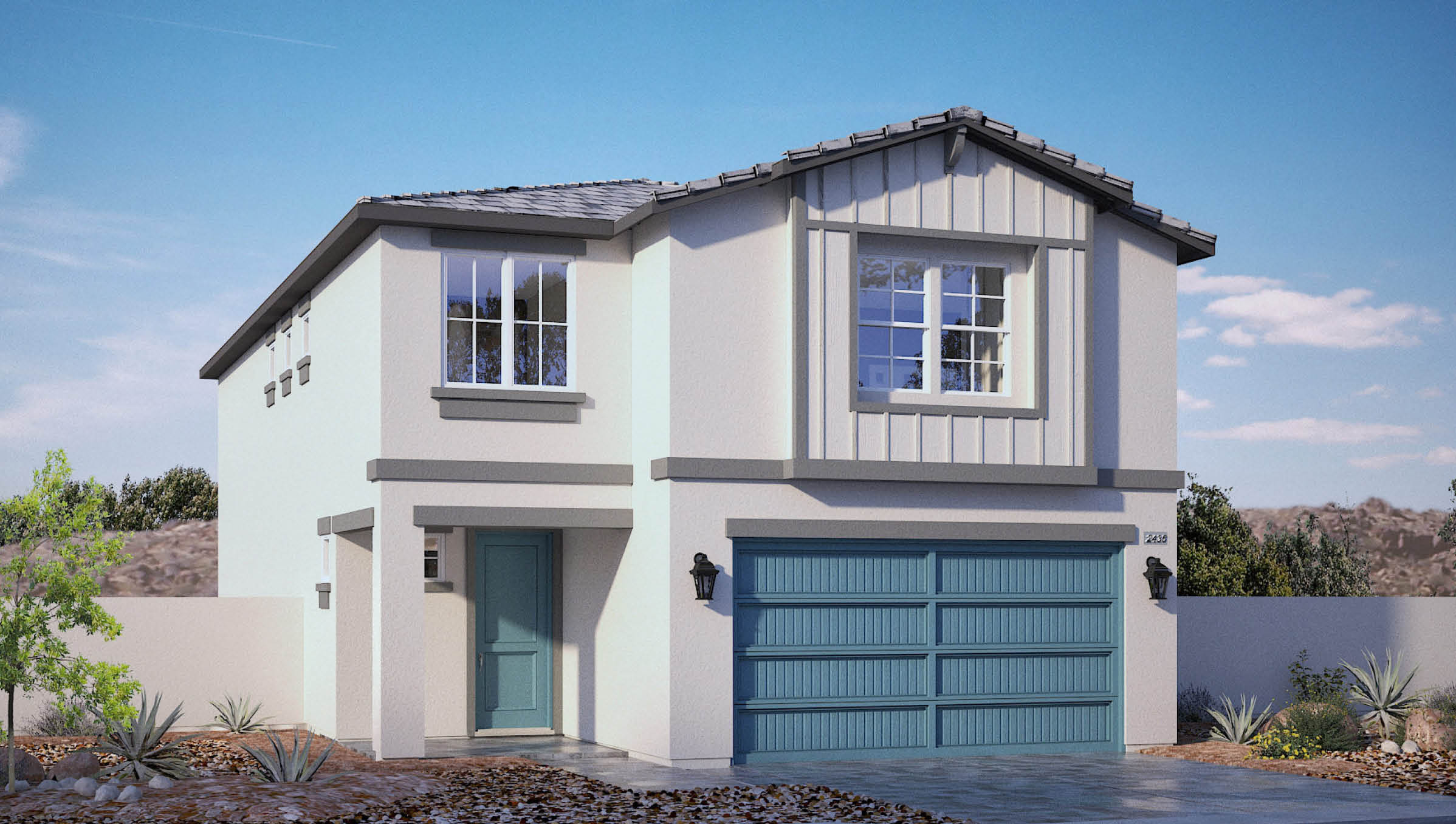 Our 2436 model home in the Azure Falls community with white and blue exterior paint schemes, a flat tile roof, 2-car garage, front yard landscaping, and paver walkways.