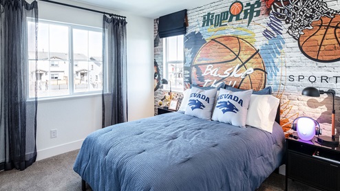 Secondary bedroom decorated for sports kid