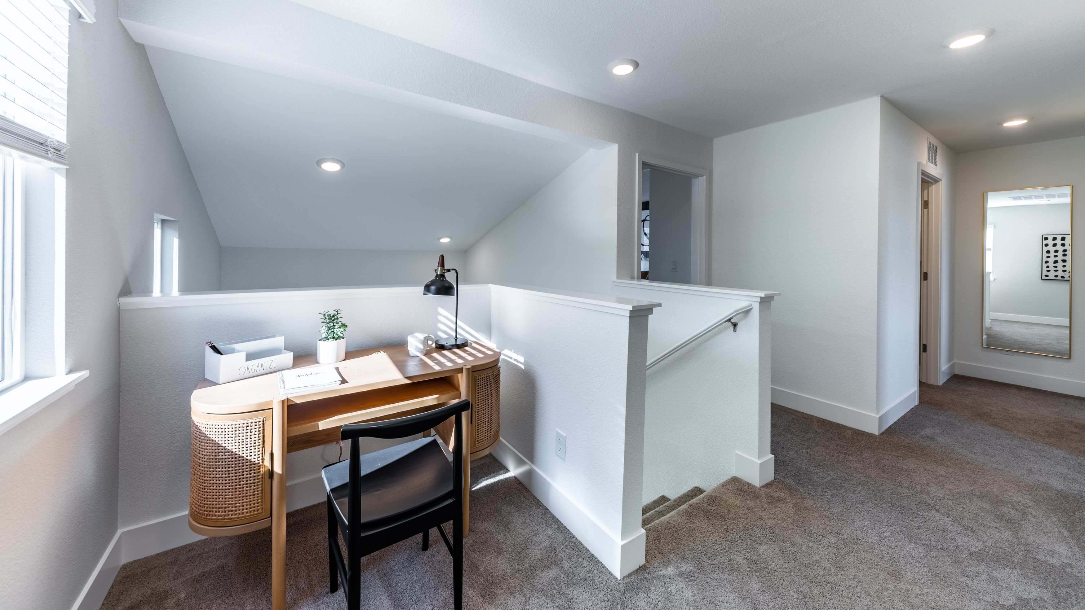 Upstairs loft with a desk