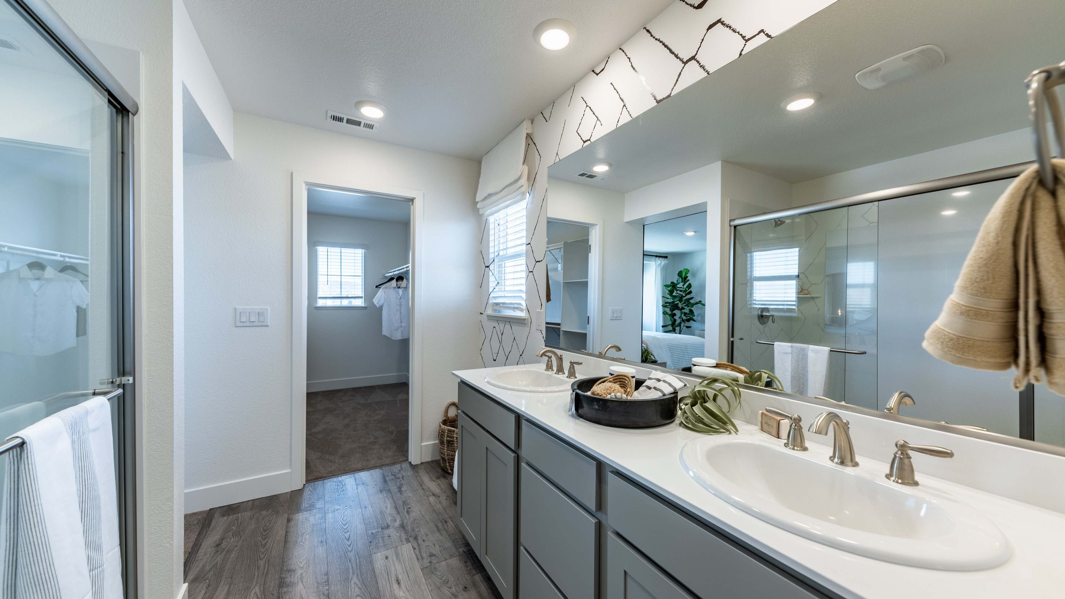 Double vanity across from the walk in shower