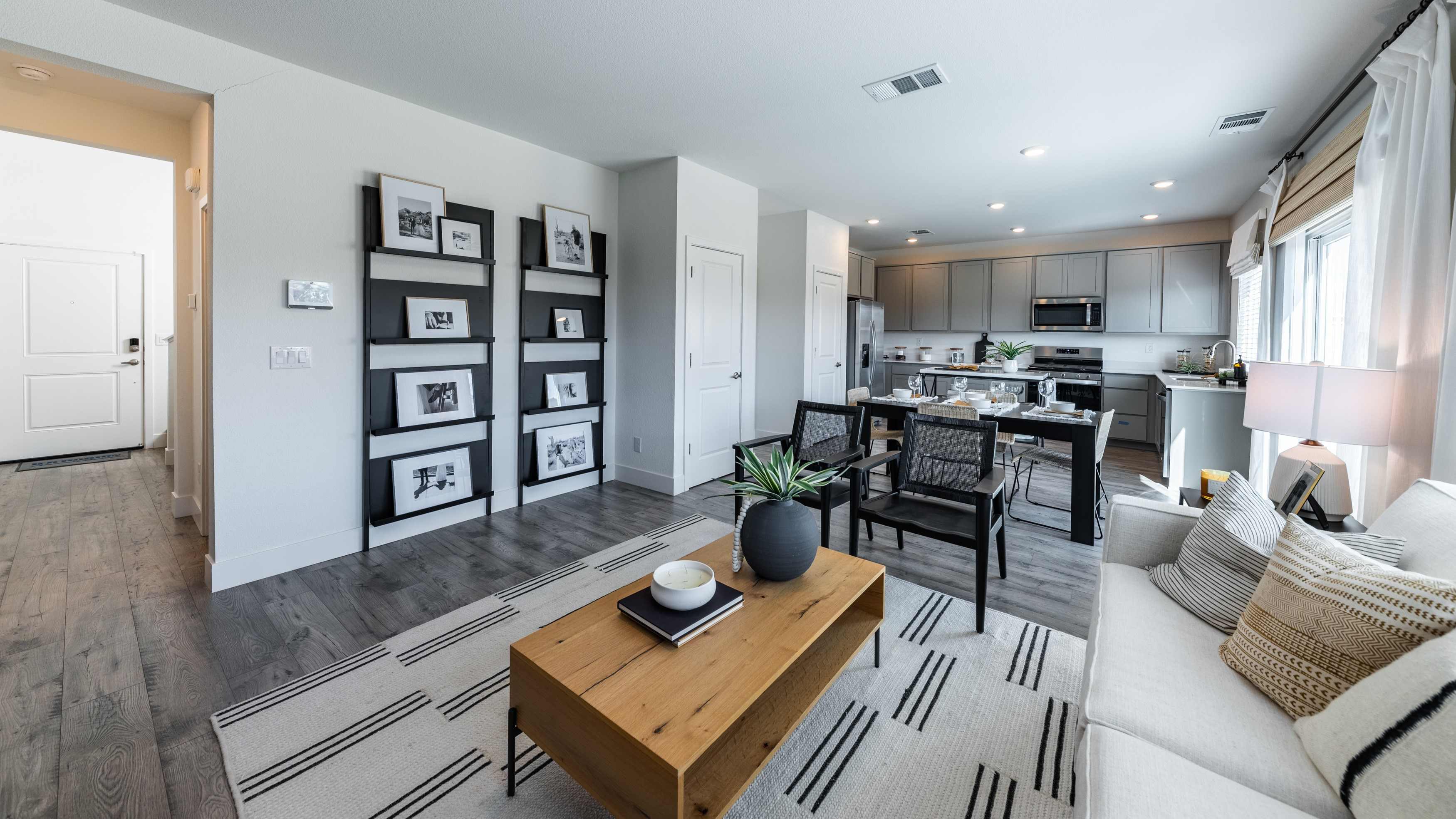 Open concept living area with large windows