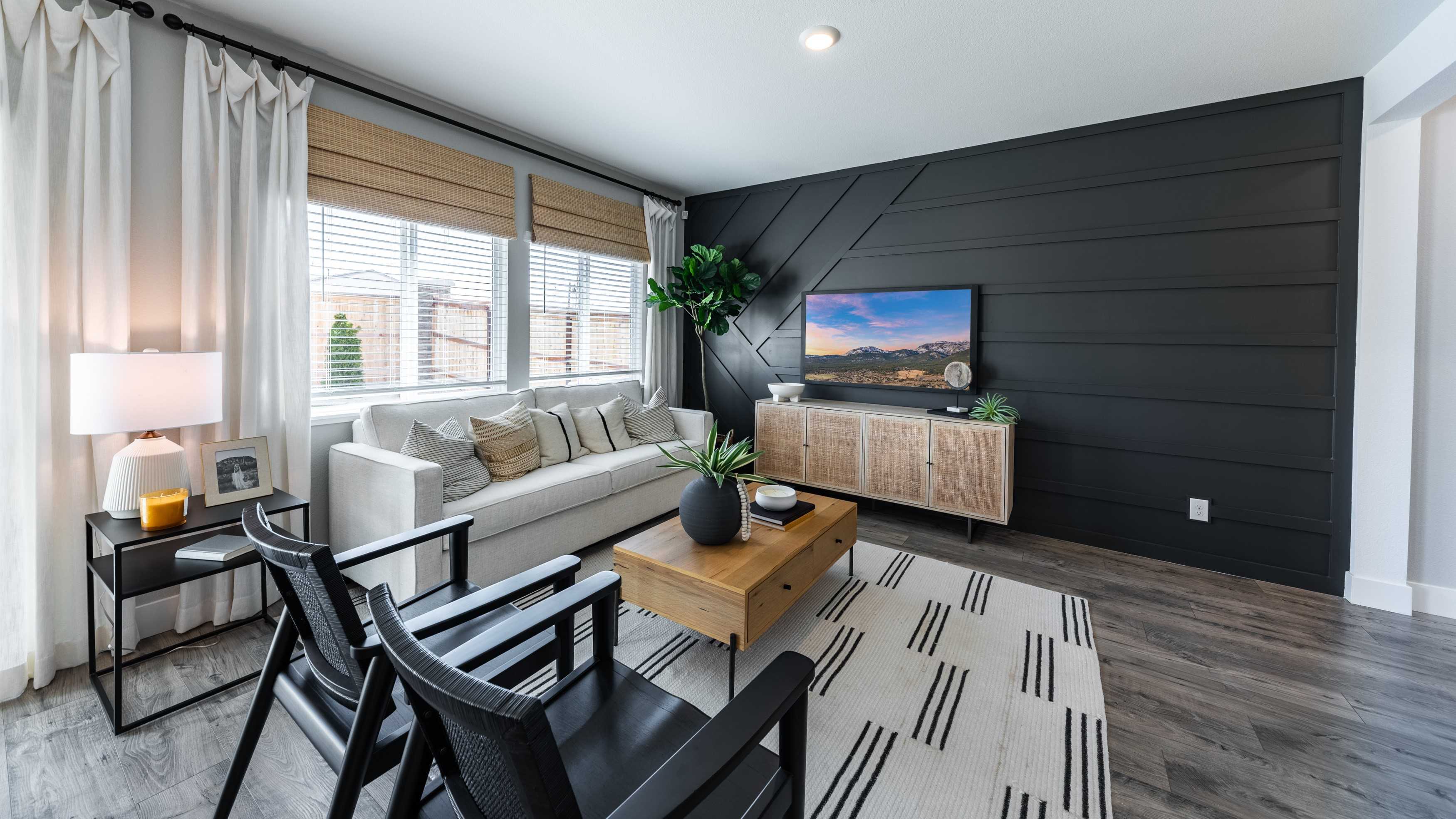 Modern living room with bright natural light and modern decor