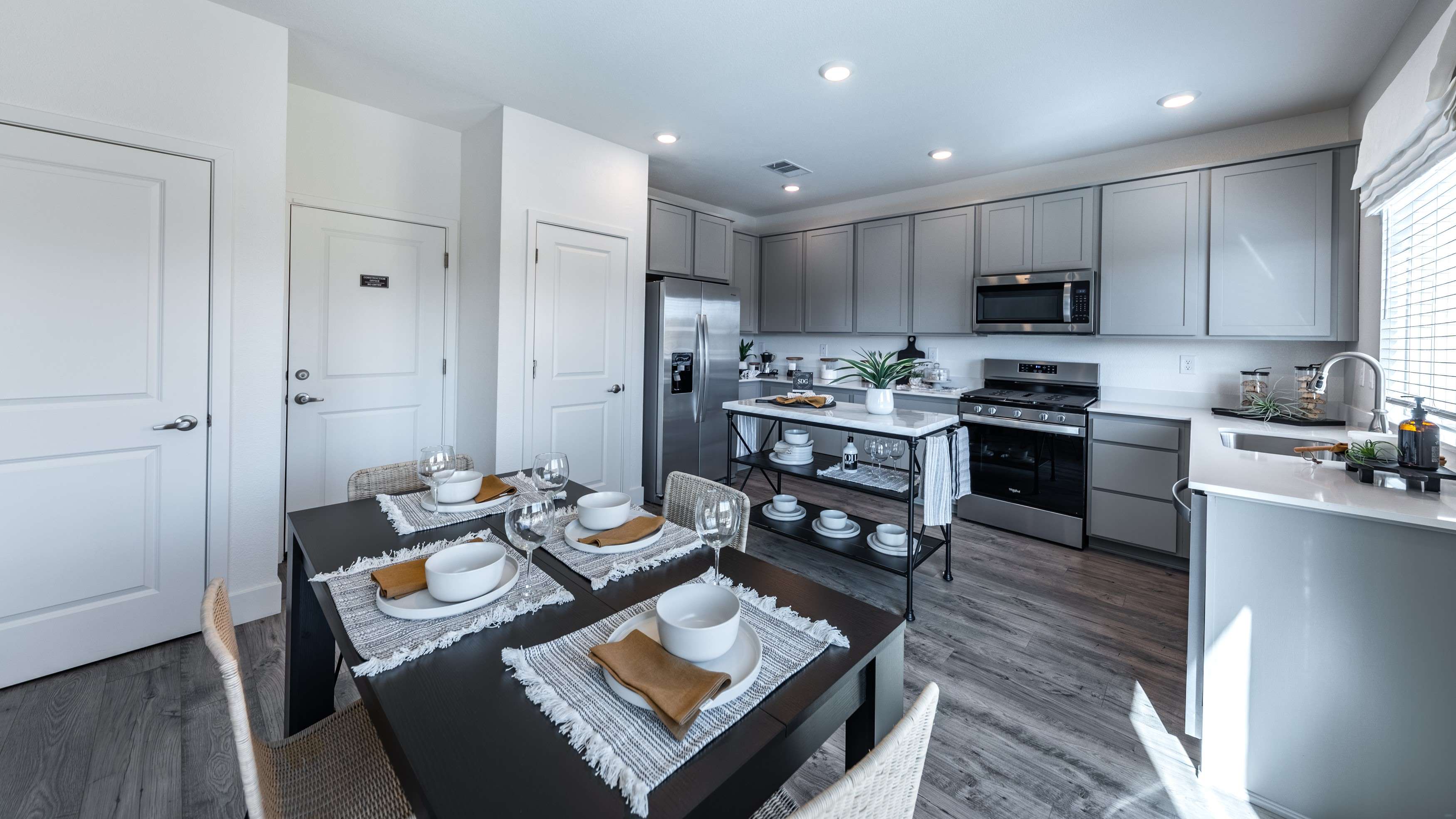 Dining area next to modern kitchen