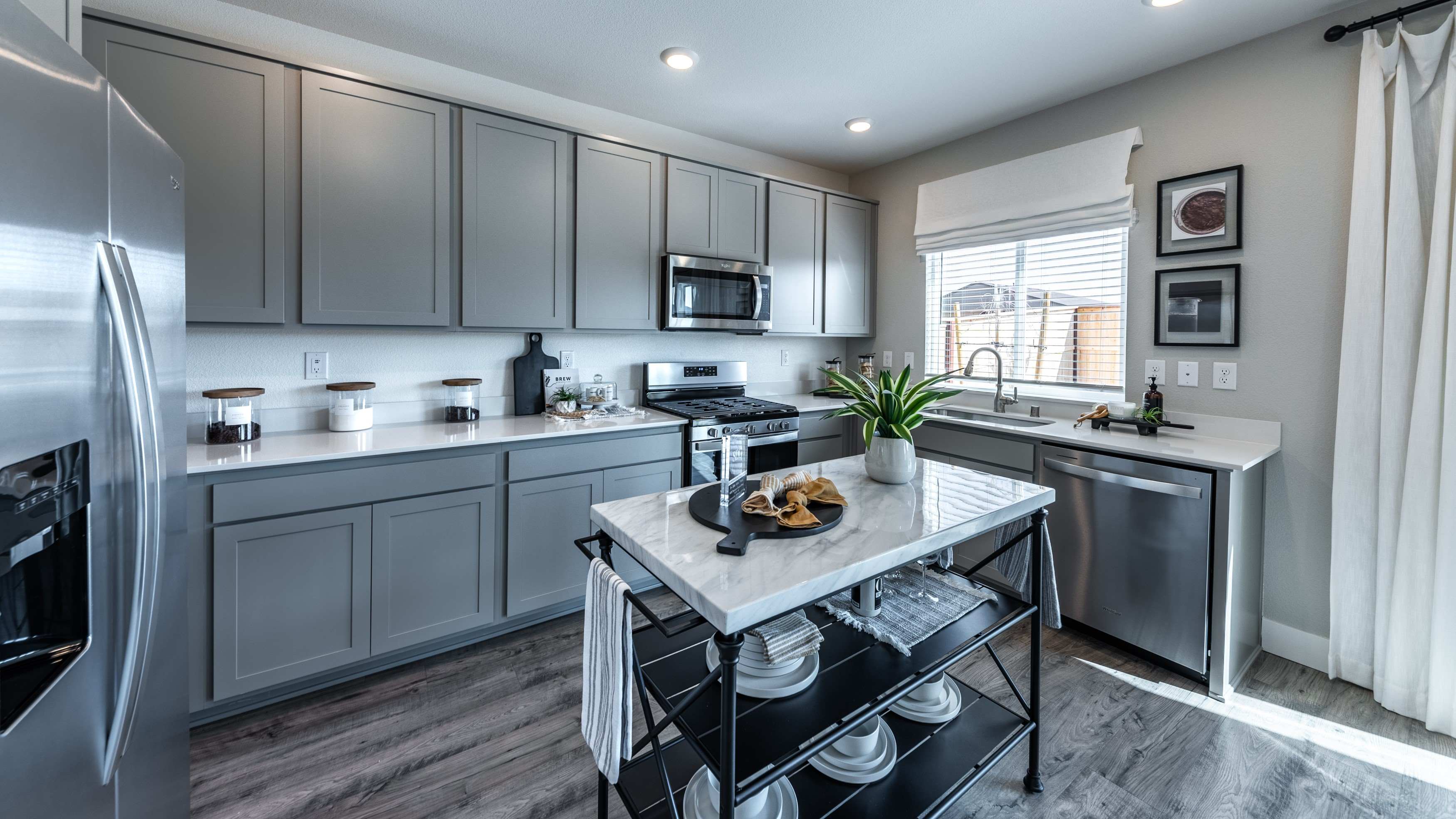 Modern kitchen with grey cabinets