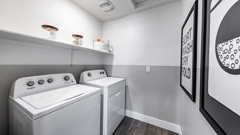 Laundry room with shelf