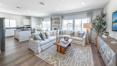 Open concept living area with large windows
