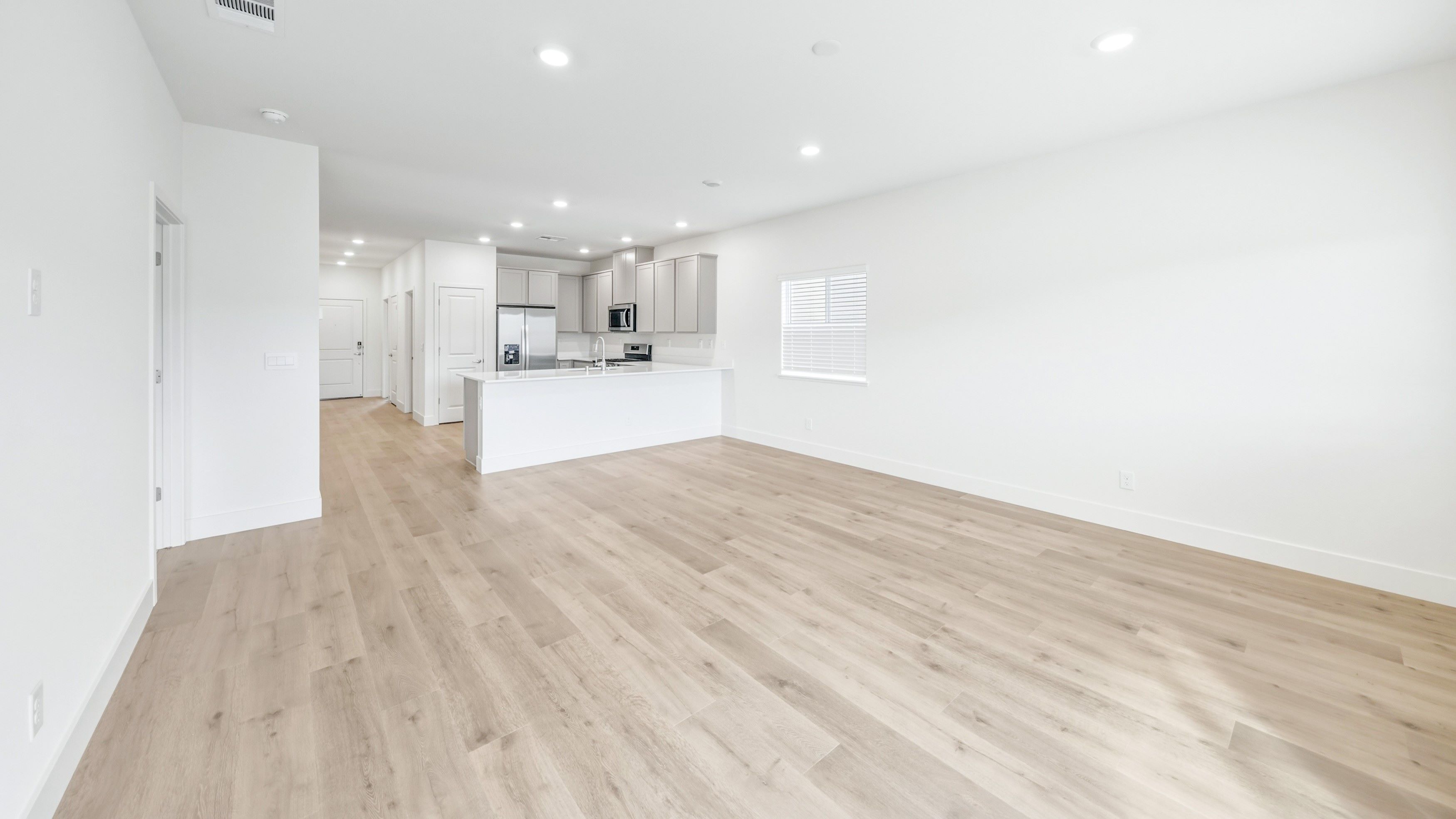 Great room looking towards kitchen and dining area