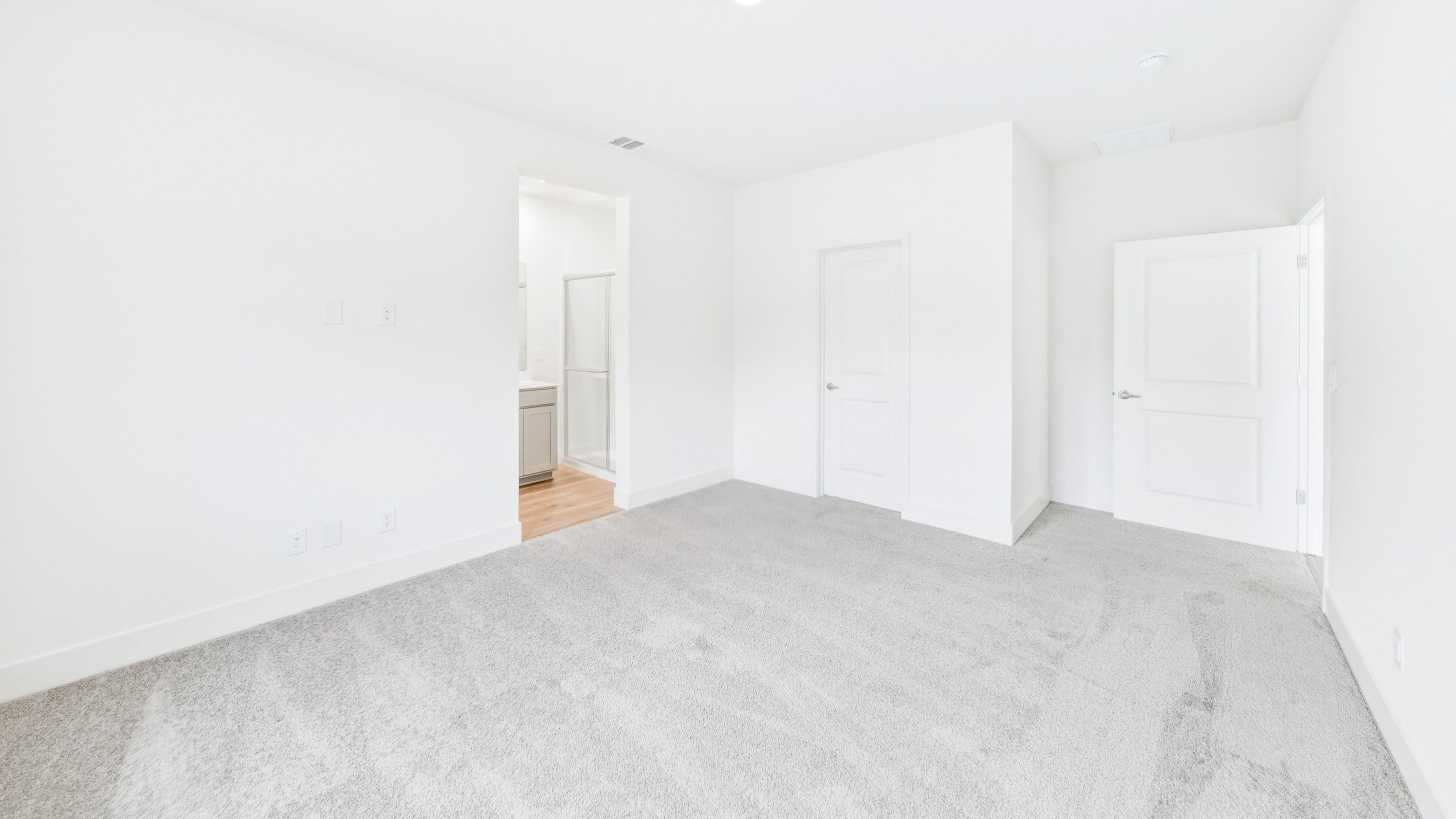 Primary bedroom with access to the primary bathroom