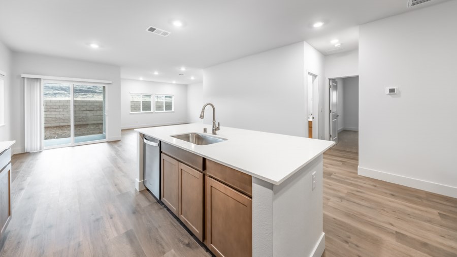Kitchen island looking out to dining and living area