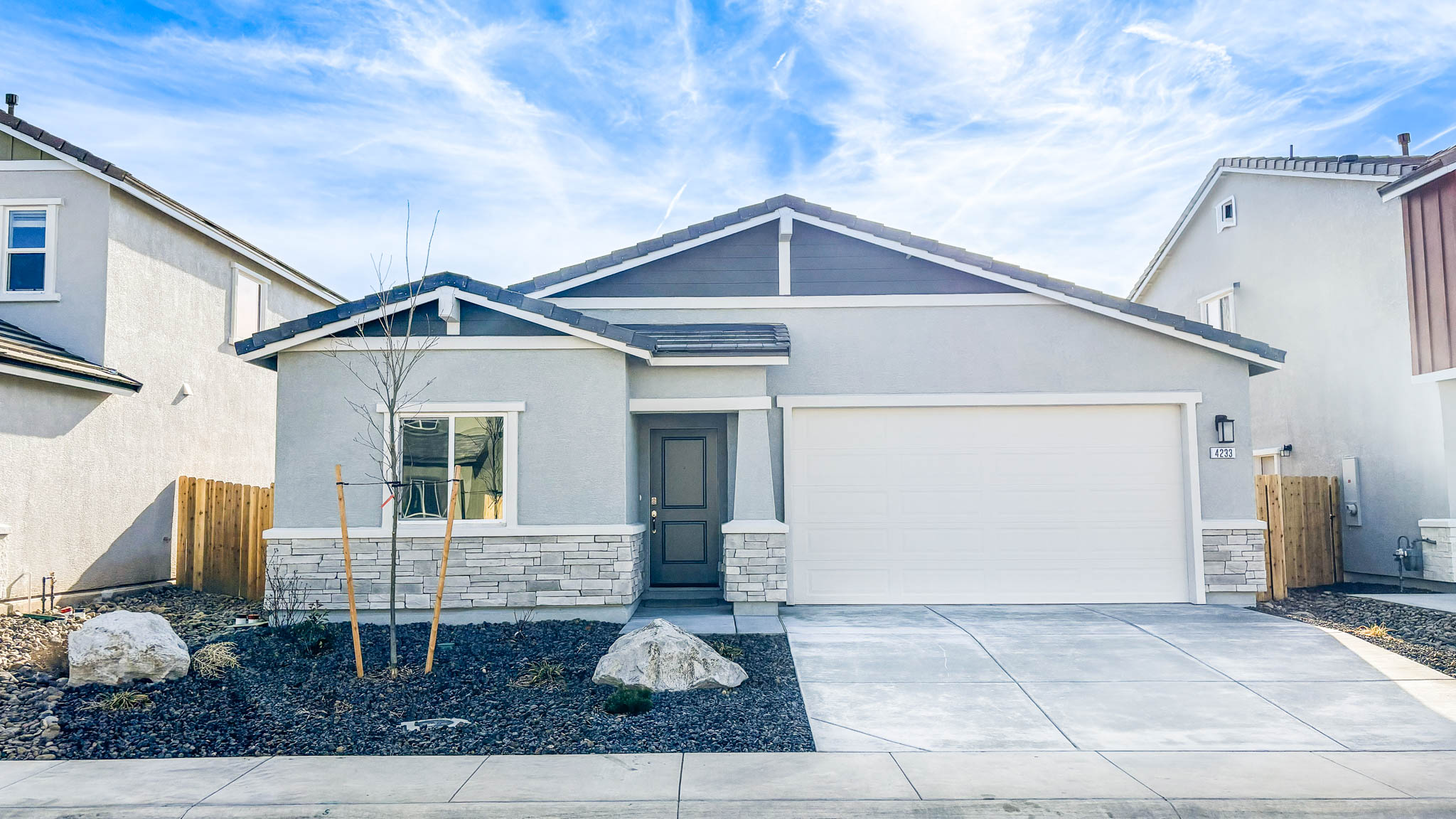Single-story Donner elevation with stucco and stone