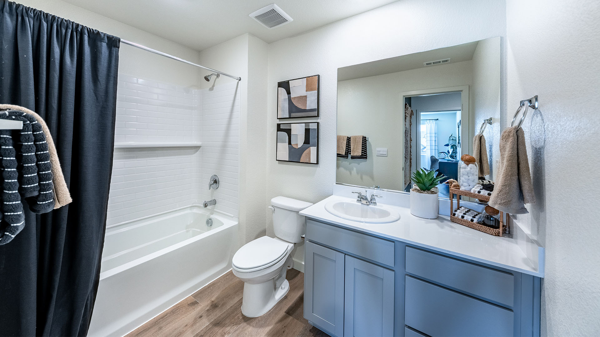 Secondary bathroom with bathtub and shower combo