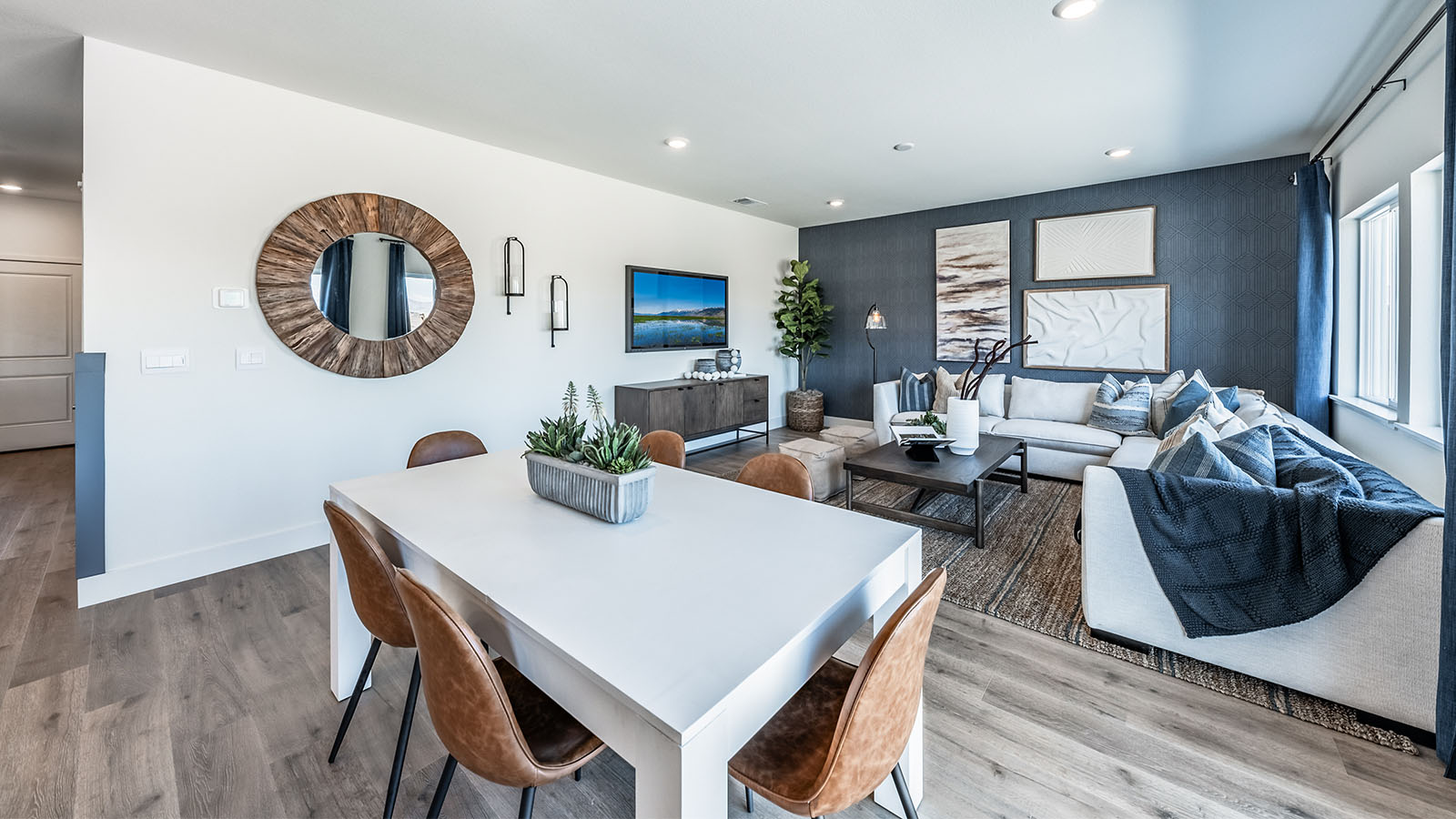 Dining area next to living room area