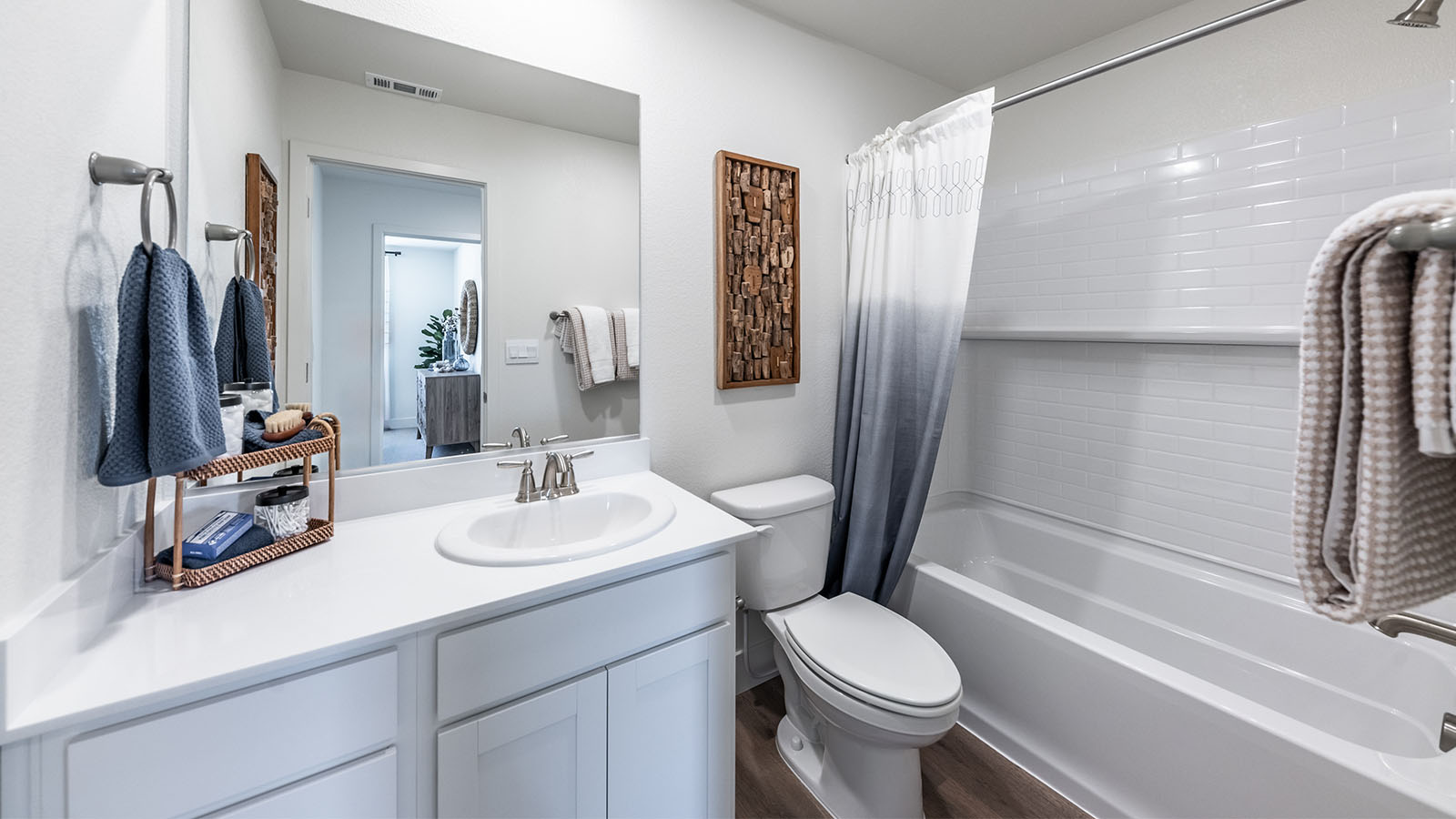 Secondary bathroom with a bathtub and shower combo