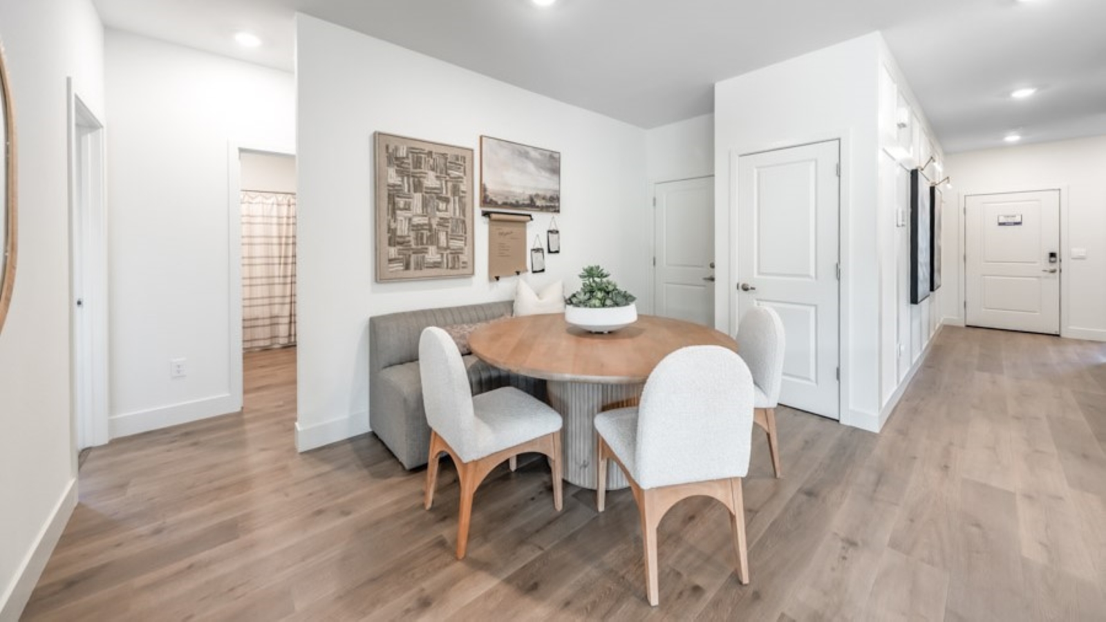 Dining area next to kitchen and living room