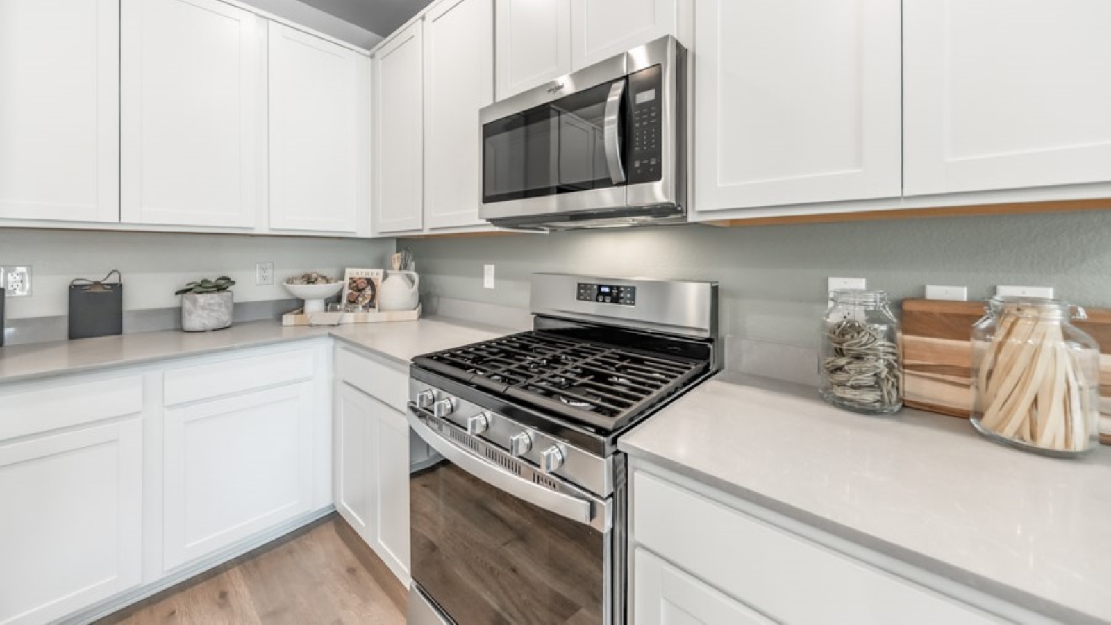 Modern shaker-style cabinets and stainless steel appliances