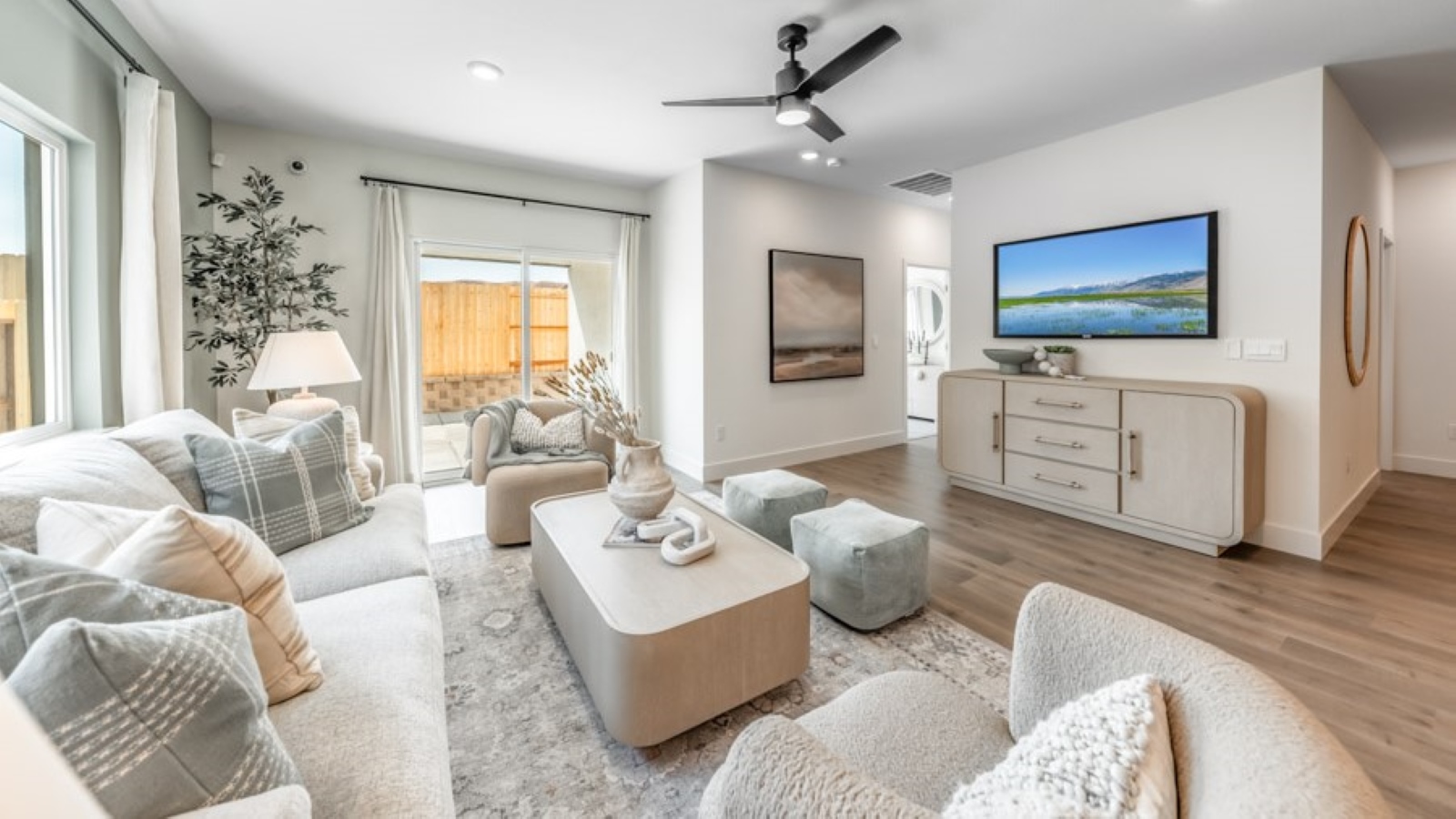 Living room next to primary bedroom