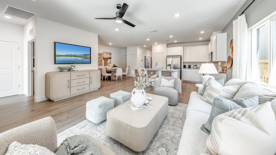 Living room looking out to dining and kitchen area