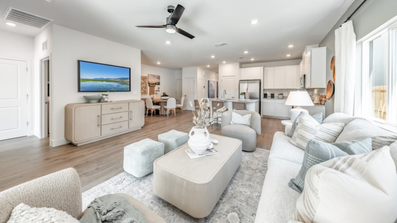 Living room looking out to dining and kitchen area