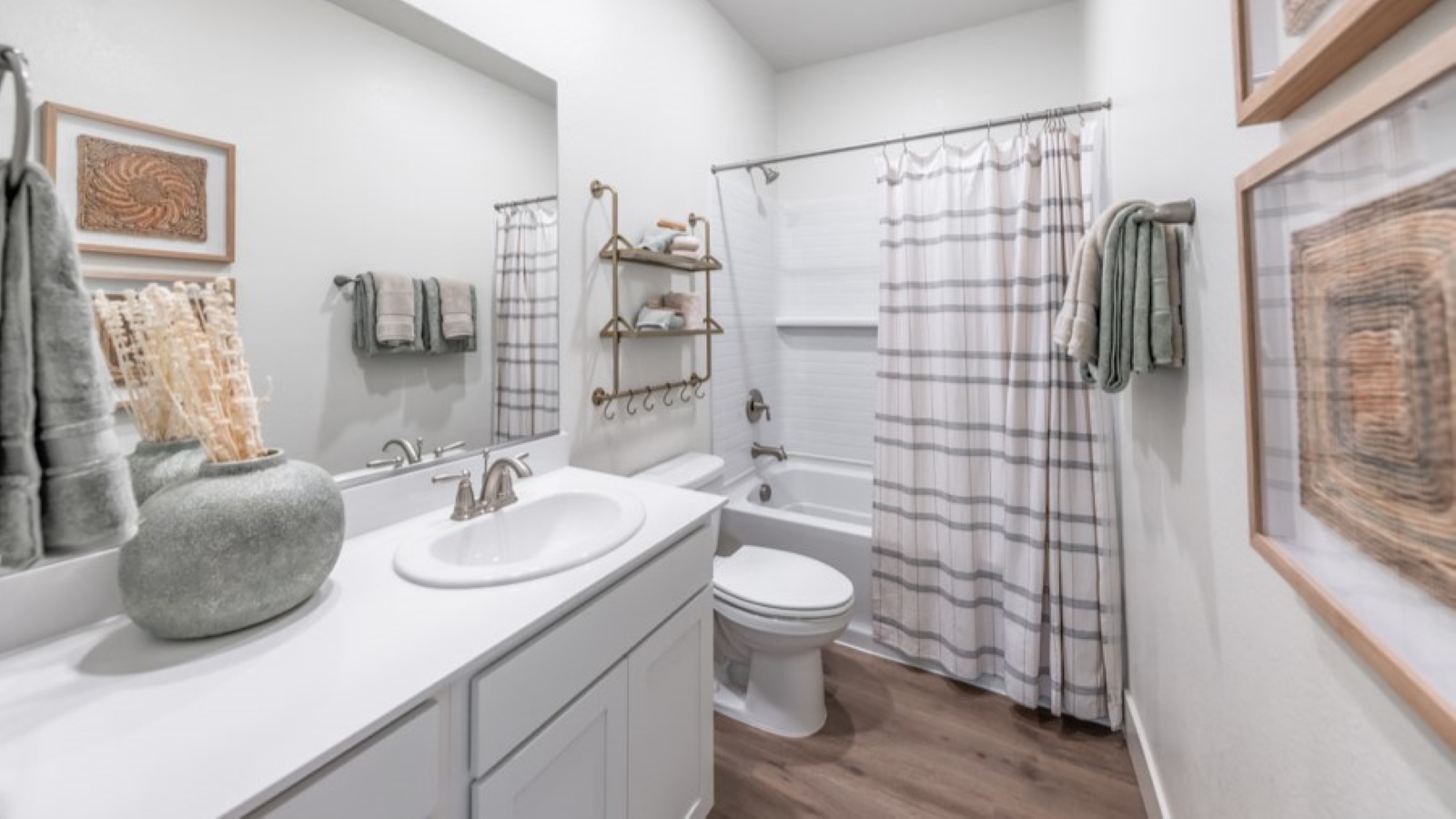 Secondary bathroom with bathtub and shower combo